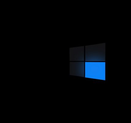 A close-up view of a stylized Windows logo with a blue accent against a black background