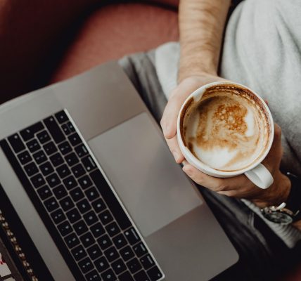 Coffee, cup, computer — Massage Nuru London Experiences Focused on Sensual Relaxation, Intimate Connection, and Therapeutic T